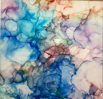 Tavla i alkoholbläck. Vit ram 22x22 cm. Målningen med passepartout 14x14 cm.