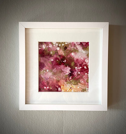 Tavla i alkoholbläck. Vit ram 20x20 cm. Målningen med passepartout 11.5x11.5 cm.